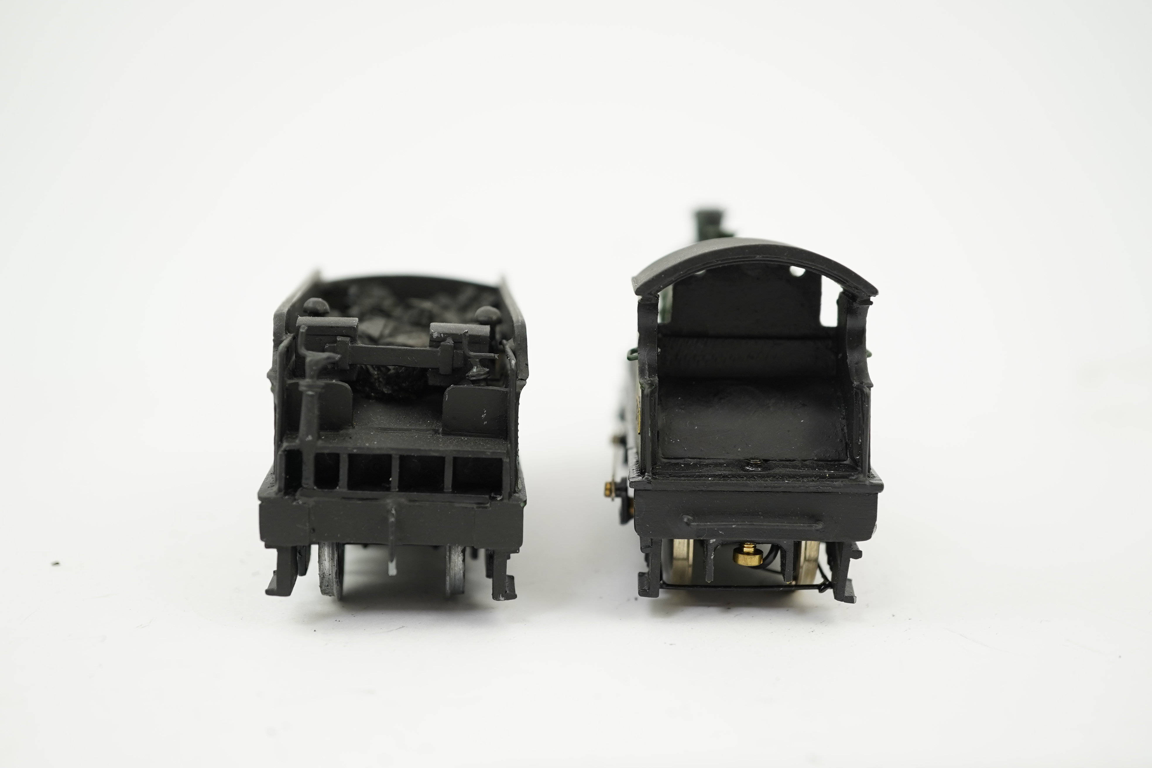 Three 00 gauge brass and white metal kit built GWR tender locomotives; a 2884 class 2-8-0, 2884, together with an 33xx class 4-4-0, 3454, and a War Dept. 2-8-0, 3012, all constructed, painted and lined to a high standard